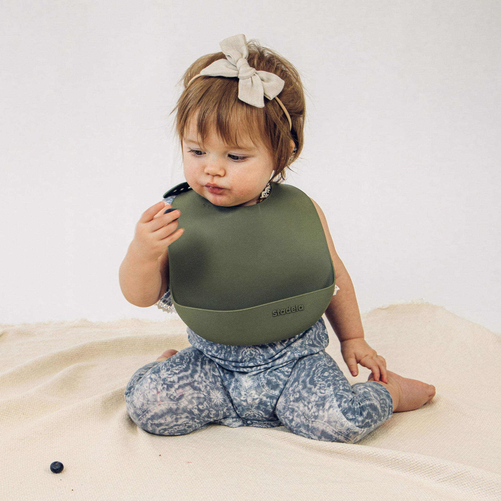 Best baby bibs, gift for baby shower, birthday, Christmas, Rust Colored, Boho Flowers in Earth Toned Colors, Eco friendly, sustainable, silicone bibs, baby led weaning, 6 months baby essentials, starting solids, shop small, toddler must haves, neutral design for baby girl or baby boy, easy clean up