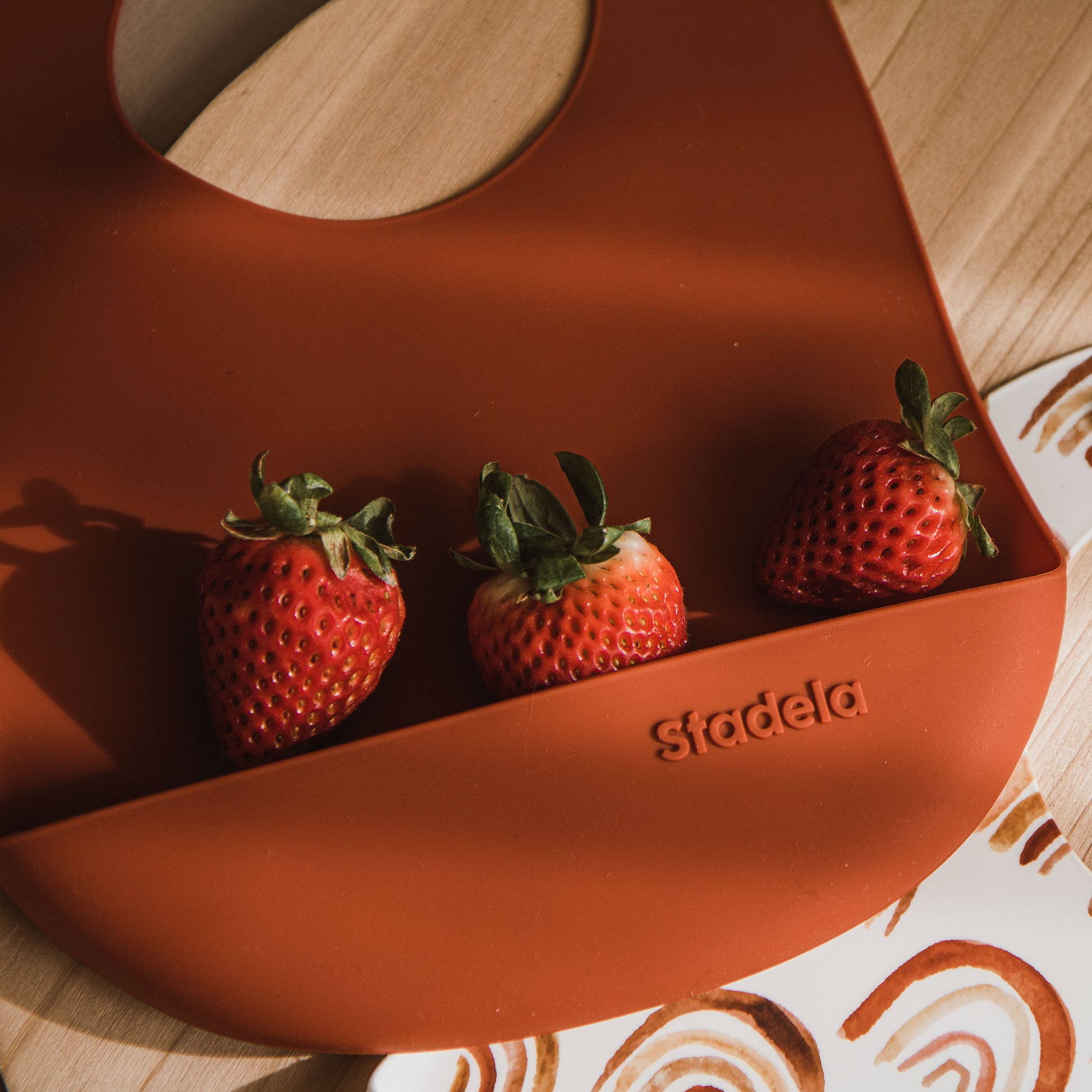 Best baby bibs, gift for baby shower, birthday, Christmas, Rust Colored, Boho Flowers in Earth Toned Colors, Eco friendly, sustainable, silicone bibs, baby led weaning, 6 months baby essentials, starting solids, shop small, toddler must haves, neutral design for baby girl or baby boy, easy clean up