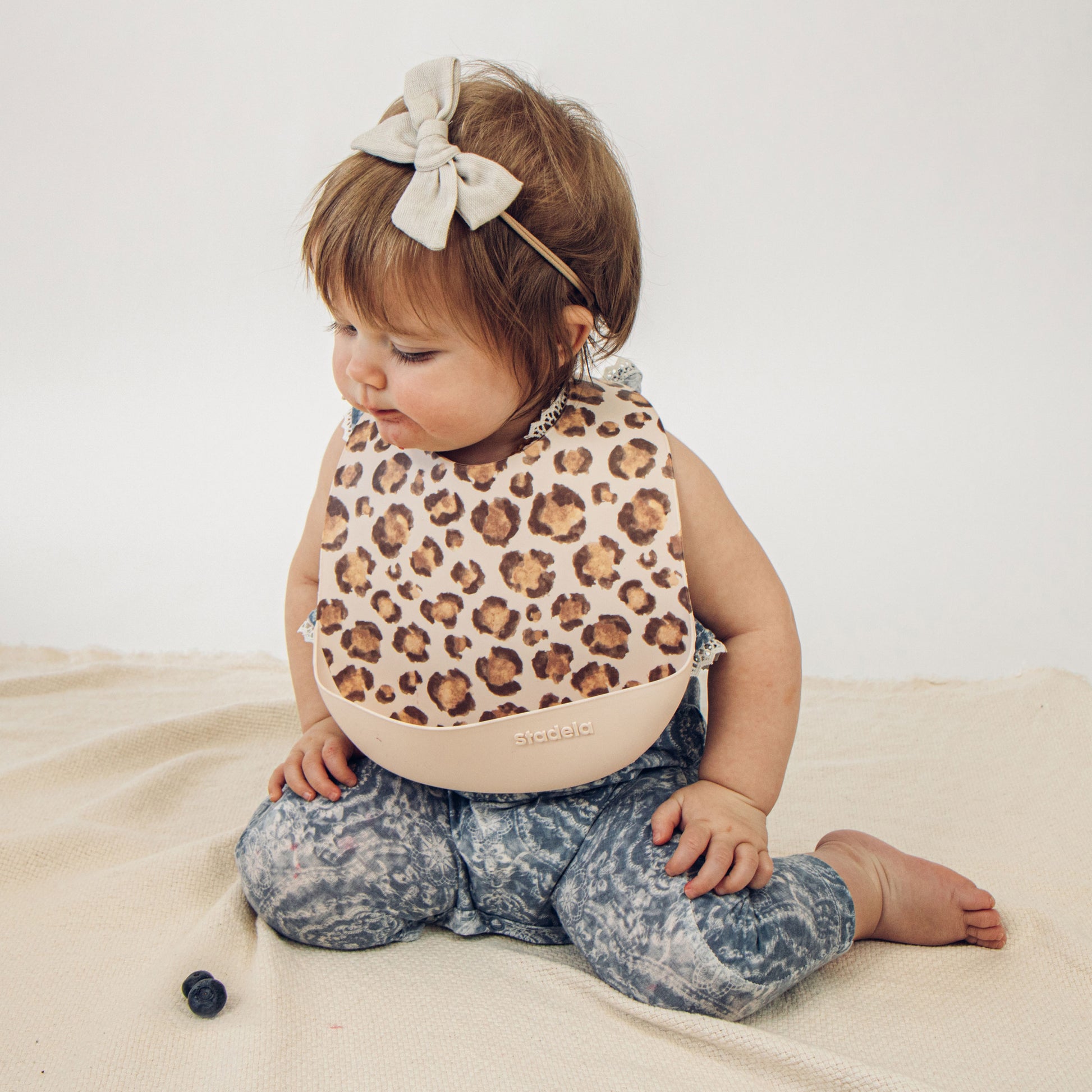 Best baby bibs, gift for baby shower, birthday, Christmas, natural, beige, brown, with leopard print, chita pint, eco friendly, sustainable, silicone bibs, baby led weaning, 6 months baby essentials, starting solids, shop small, toddler must haves, neutral design for baby girl or baby boy, easy clean up