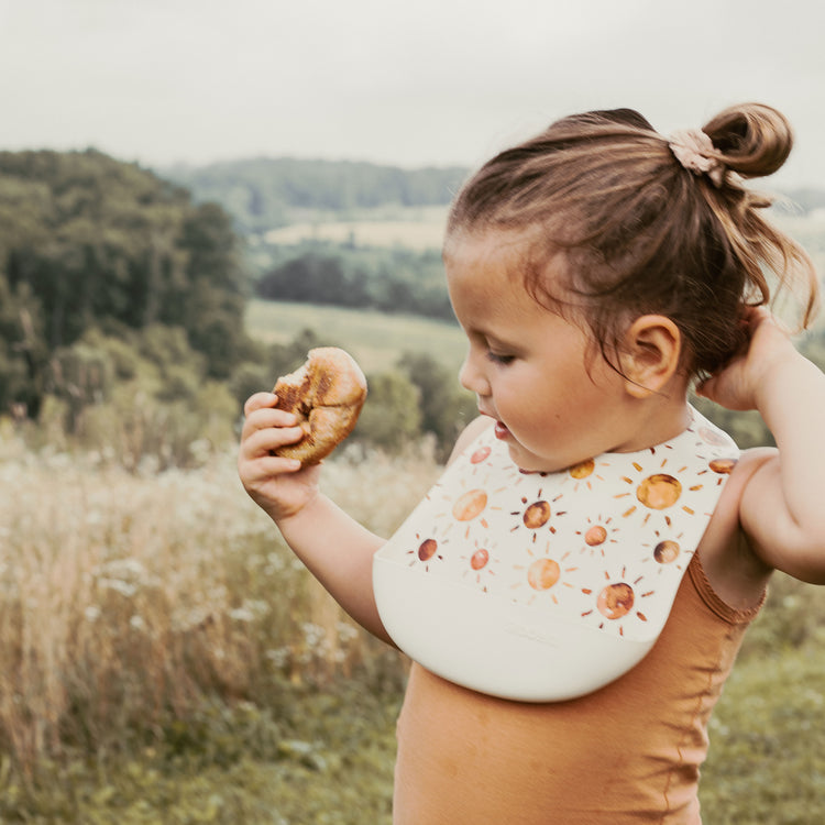 Best baby bibs, gift for baby shower, birthday, Christmas, Rust Colored, Boho Flowers in Earth Toned Colors, Eco friendly, sustainable, silicone bibs, baby led weaning, 6 months baby essentials, starting solids, shop small, toddler must haves, neutral design for baby girl or baby boy, easy clean up